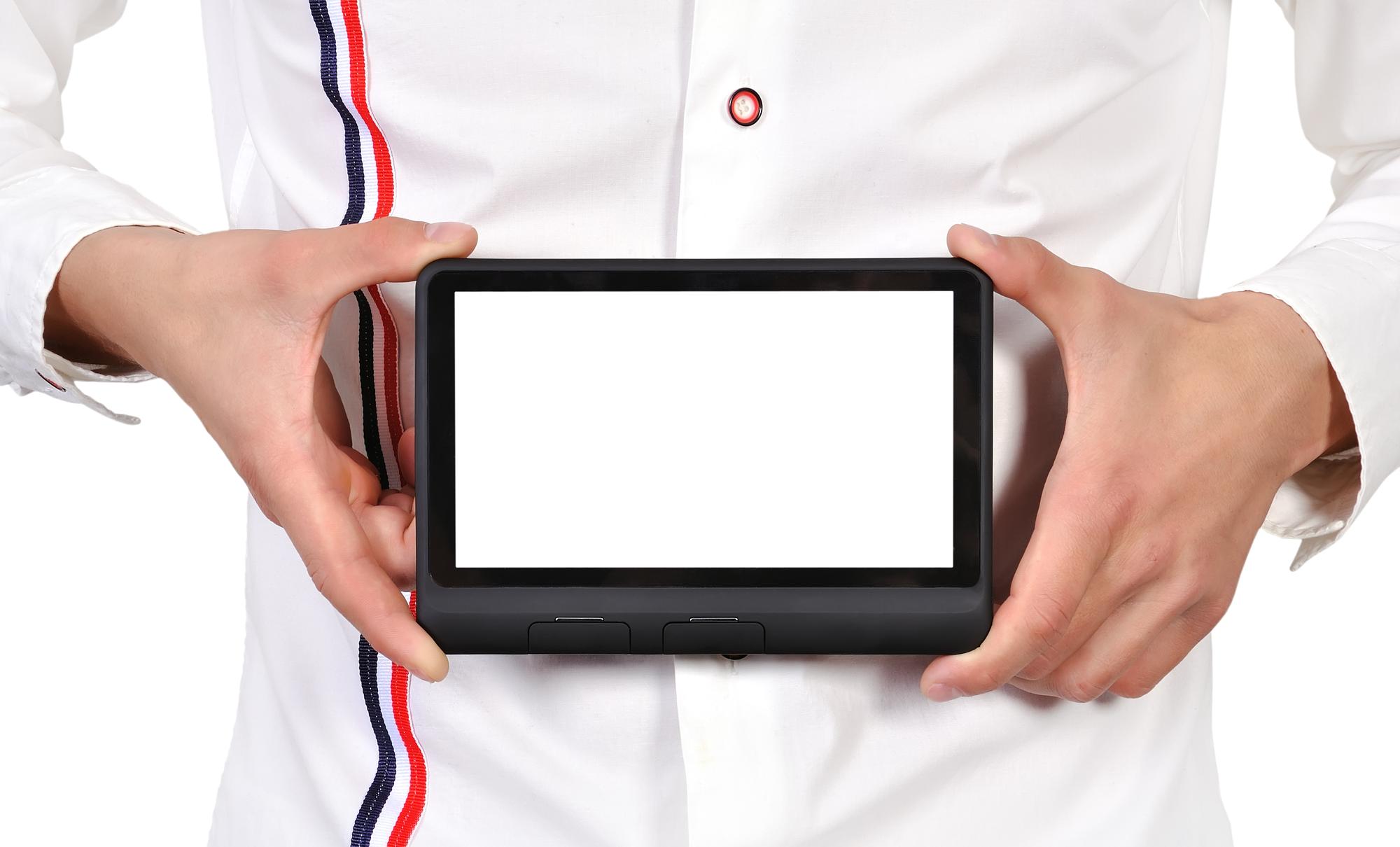 Chef demo with digital tablet and plated dish